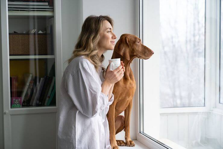 woman and dog in smart home